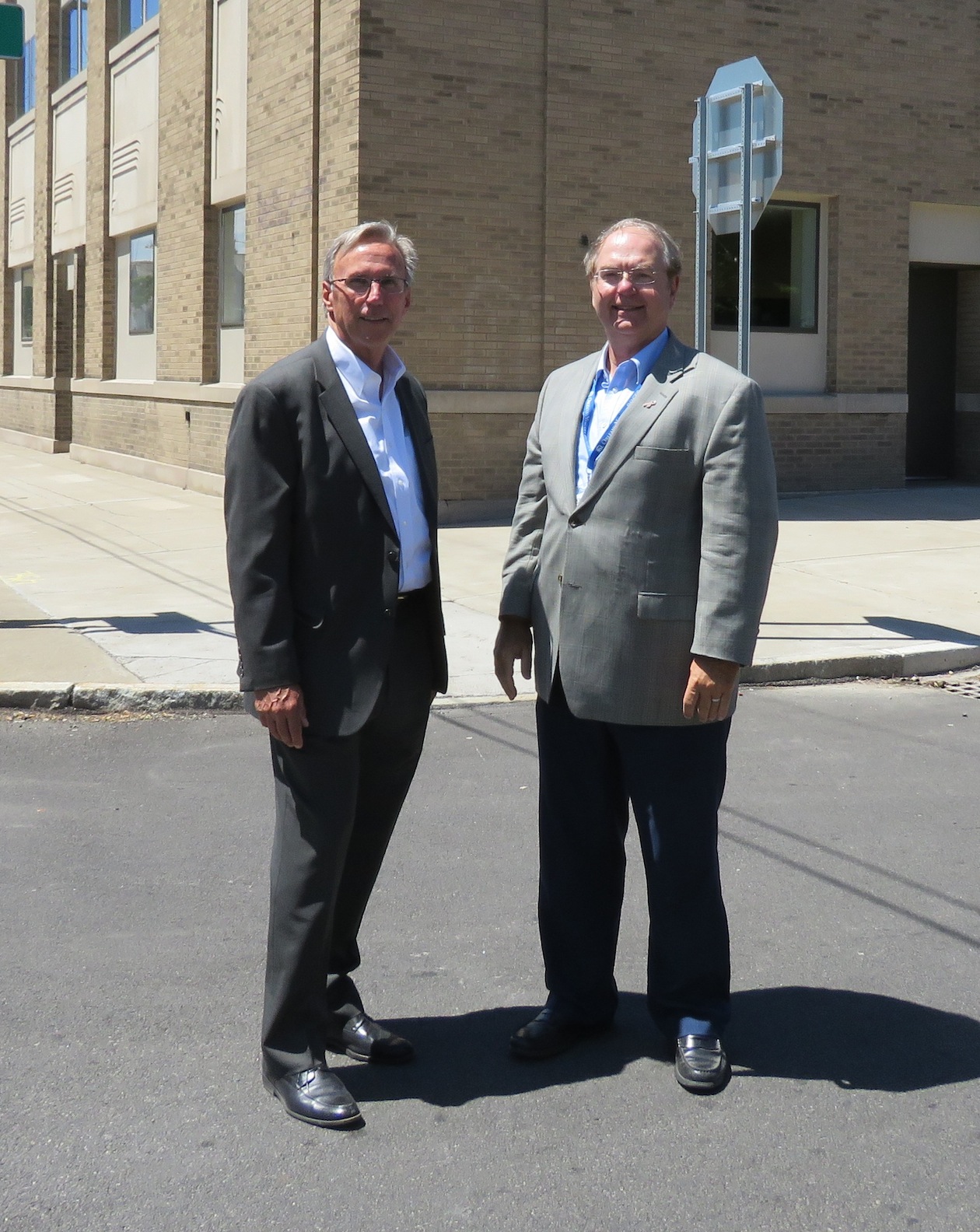 From left, Joe Steinmetz and Dr. Clark Godshall stand outside of the new center on the corner of 6th Street and Walnut Avenue. (Photos by David Yarger)